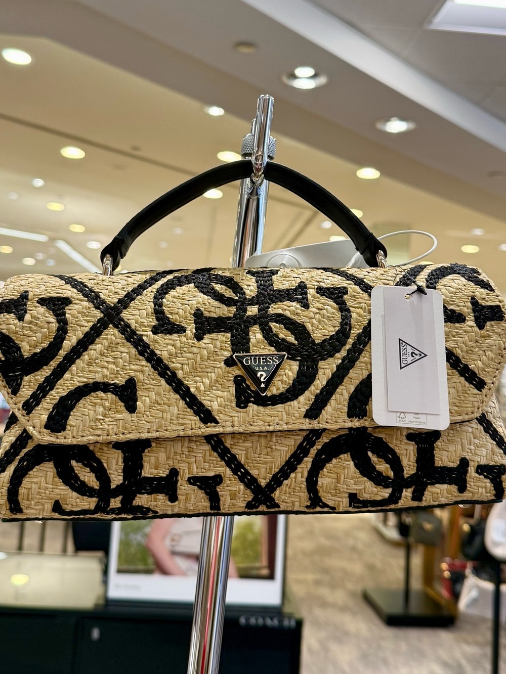 GUESS Beige Straw Shoulder Bag with Black Logo Pattern